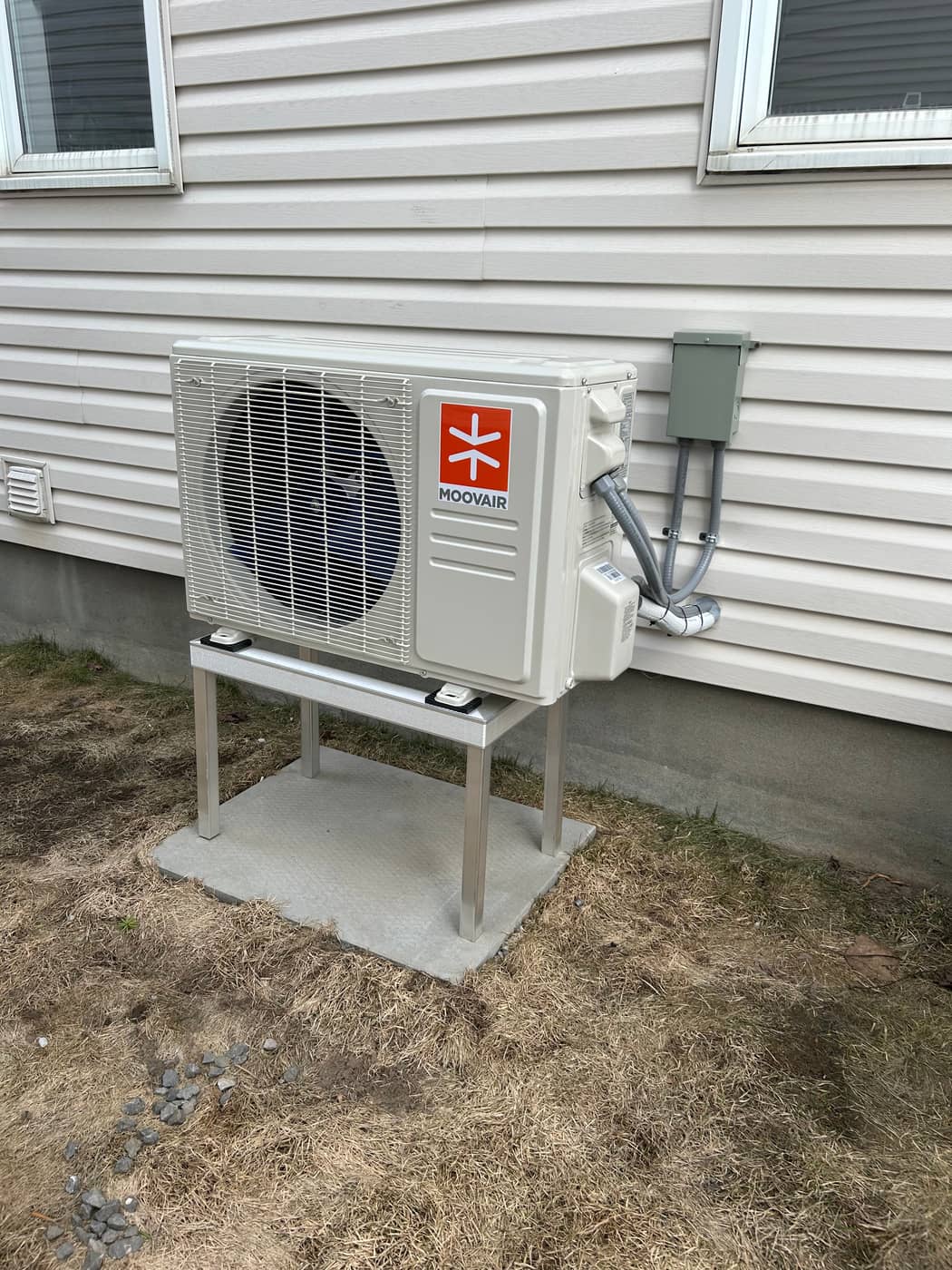 Moovair cold-climate heat pump mounted outside an east-end home